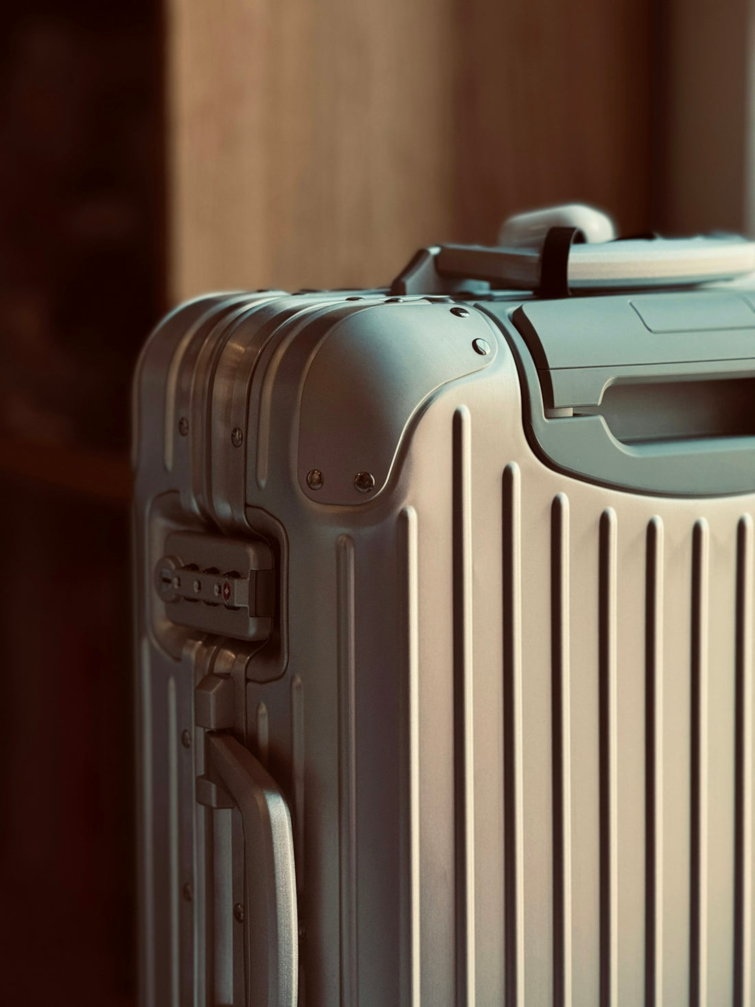 A piece of luggage sitting on top of a hard wood floor