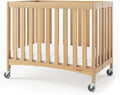 Foundations Travel Sleeper Wood Compact Folding Crib by FoundationsChildrensProducts